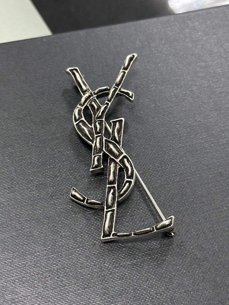 YSL brooch