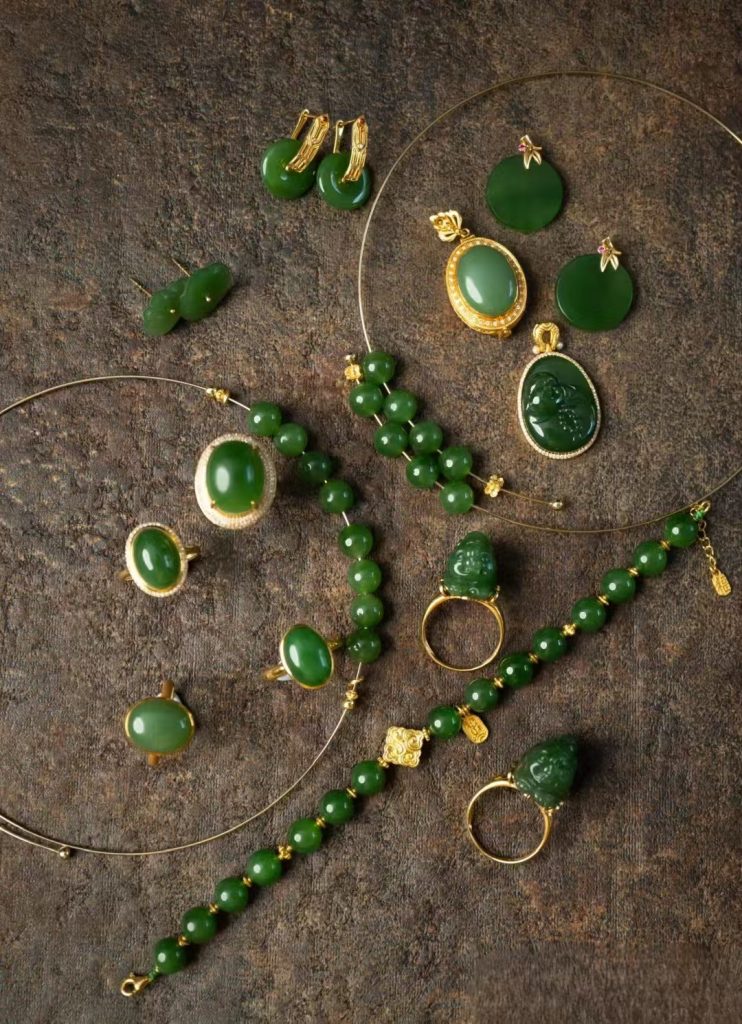 A jade jewelry via its appealing green and detailed design.