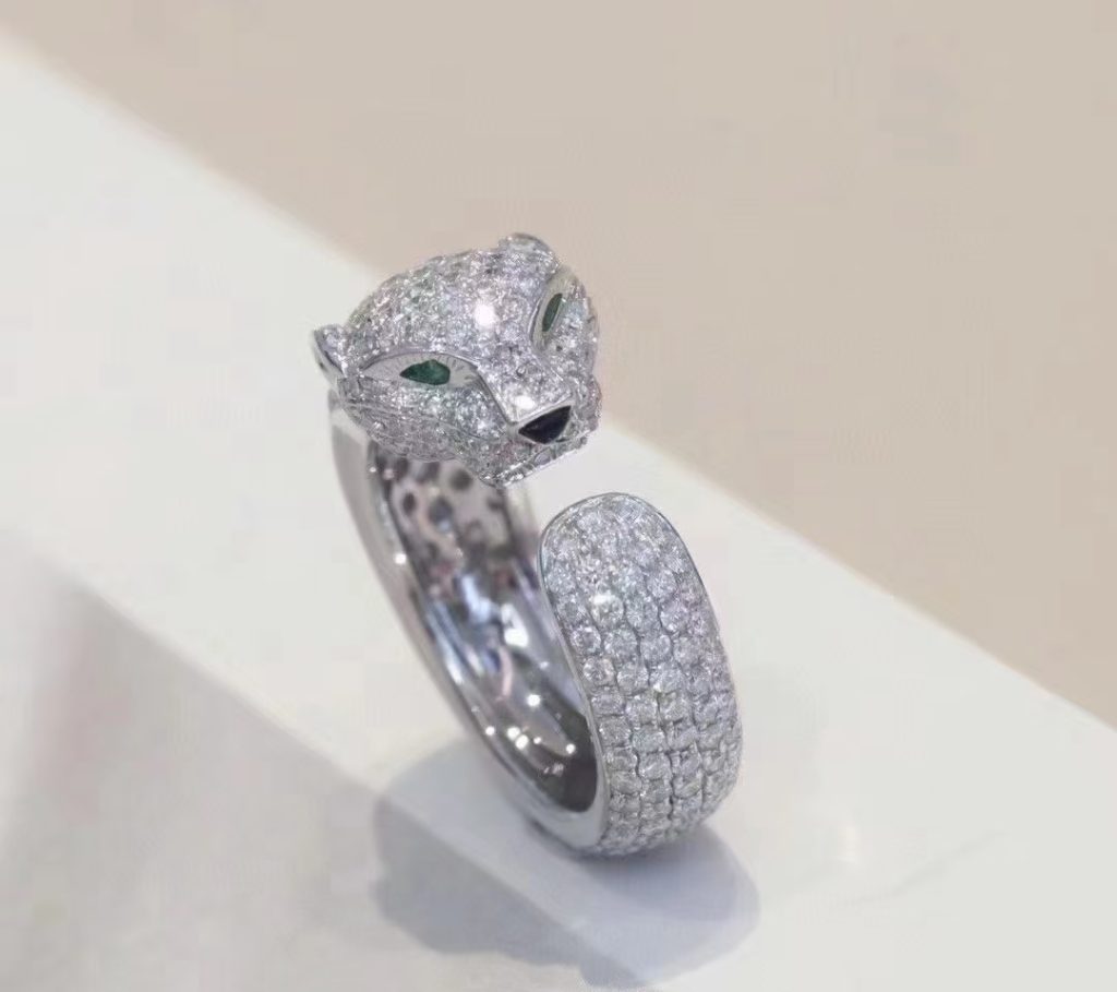Cartier Panther collection: Bold and elegant panther design with precious gemstones, symbolizing strength and elegance