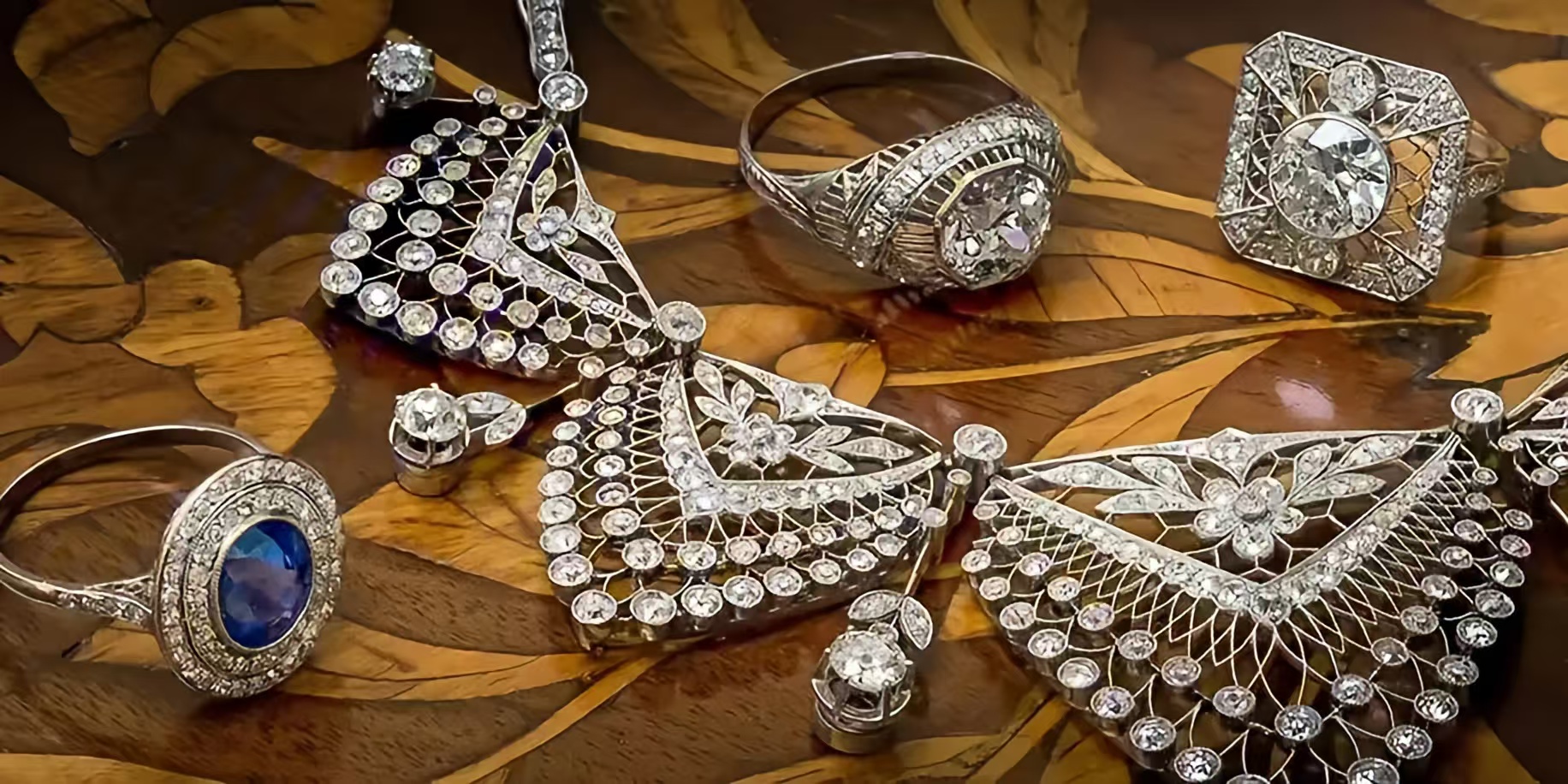 The Edwardian era is characterized by intricate designs, lace-like patterns, platinum settings, and delicate gemstone arrangements.