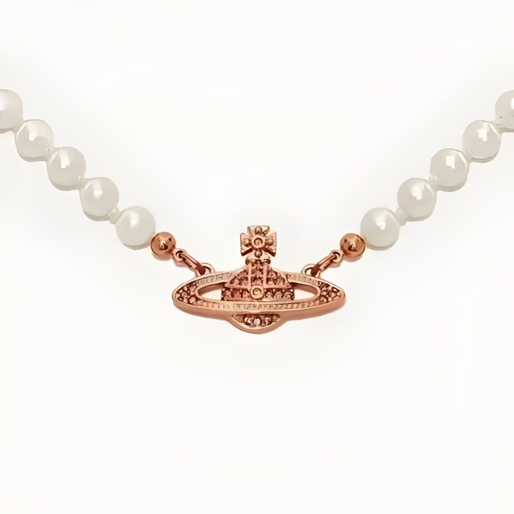 Vivienne Westwood royal heritage punk-inspired pearl beaded long pendant necklace.
